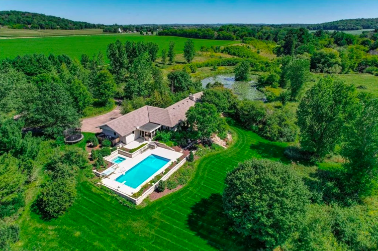 Custom built prairie style house on over 57 acres for sale in River Falls, Wisconsin