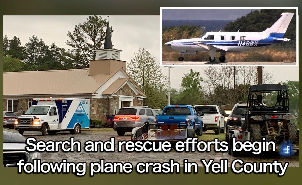 Emergency responders and search and rescue personnel work Friday afternoon plane crash in Yell County