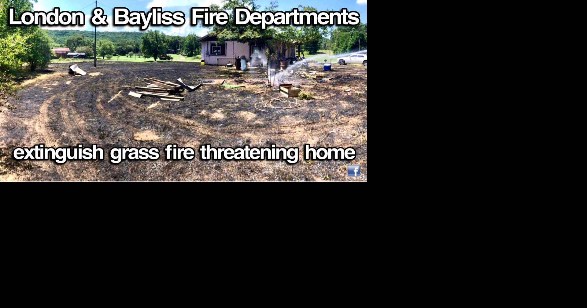 London & Bayliss Fire Departments extinguish grass fire threatening