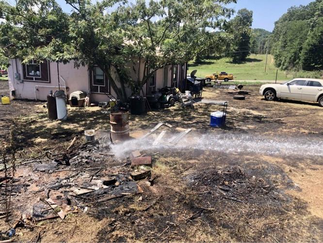 London & Bayliss Fire Departments extinguish grass fire threatening