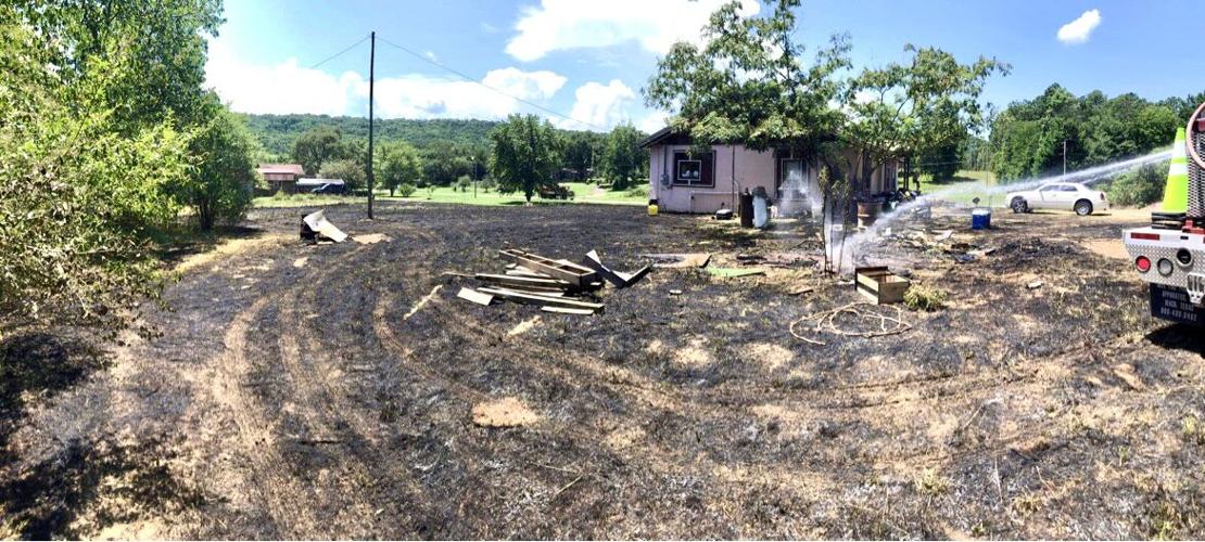 London & Bayliss Fire Departments extinguish grass fire threatening