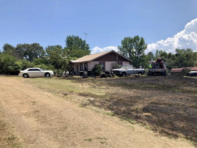 London & Bayliss Fire Departments extinguish grass fire threatening