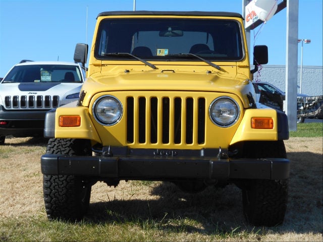 2002 Yellow Jeep Wrangler