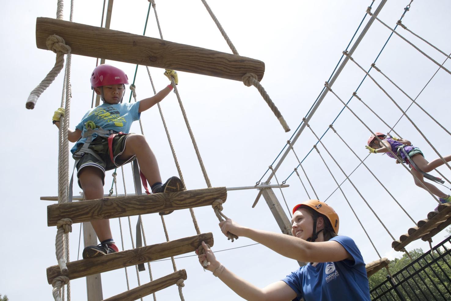 Photos Visitors explore new treetop obstacle course in Roanoke County