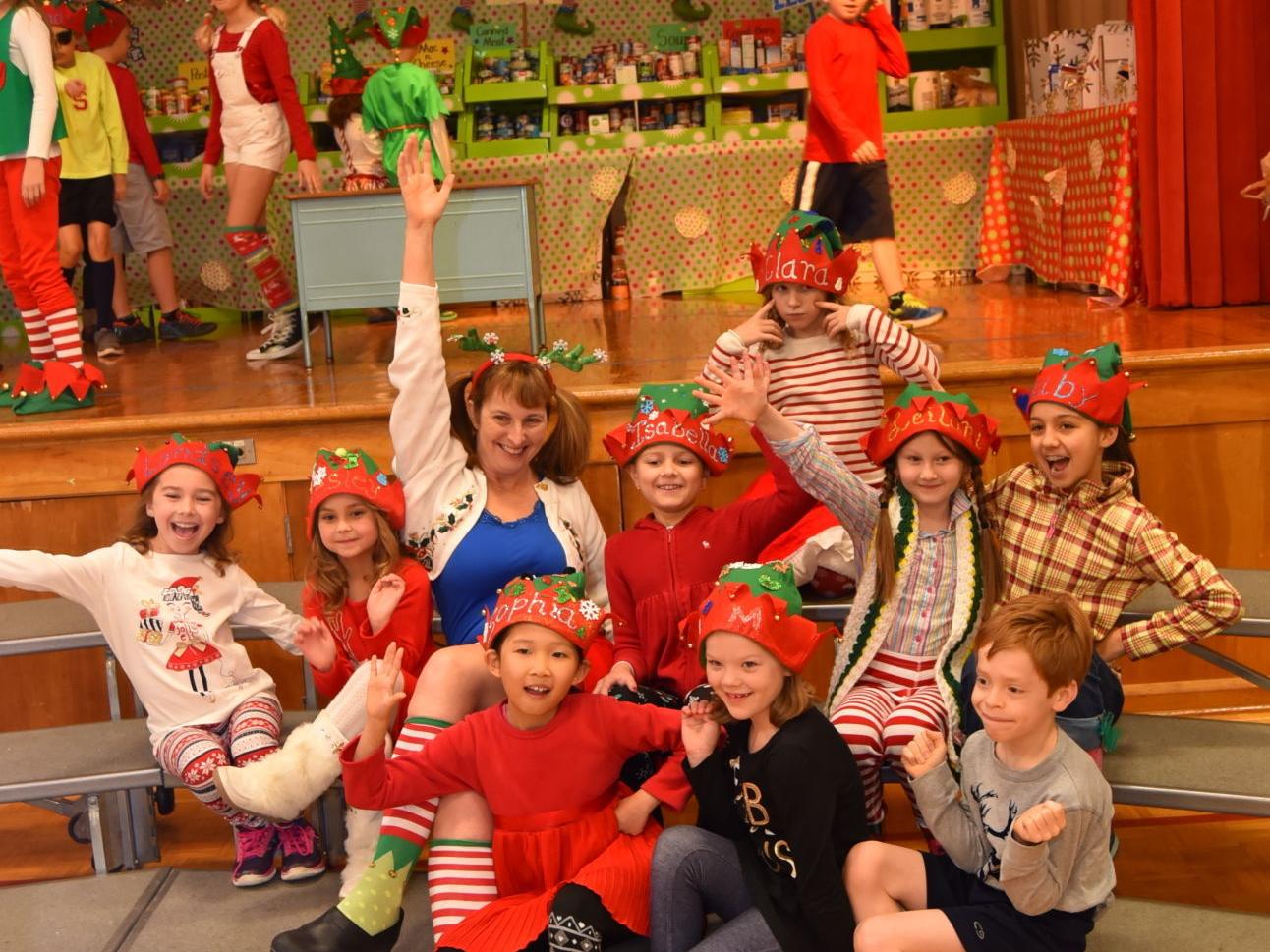 Cave Spring Elementary 'elves' stock the shelves to benefit local ...