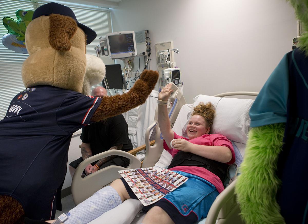 Mugsy and Southpaw visit patients at Carilion Roanoke Memorial Hospital Gallery