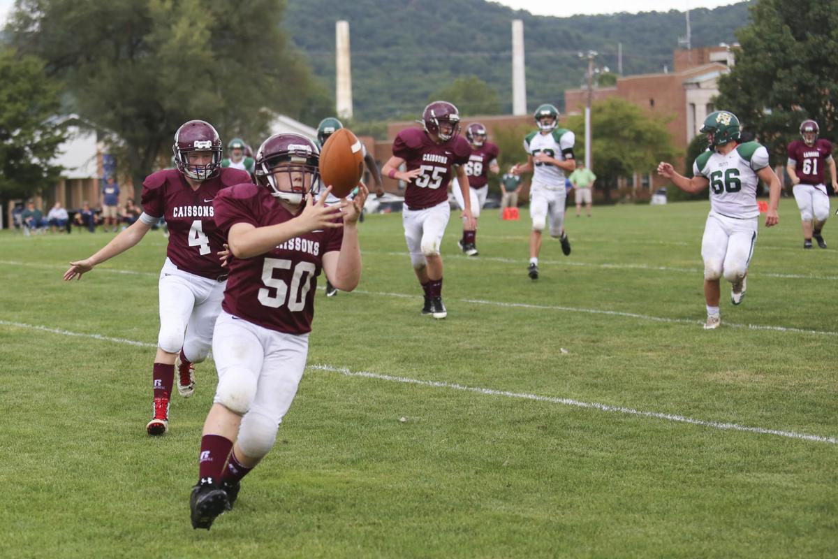 Scenes from the Roanoke CatholicFishburne Military football game on