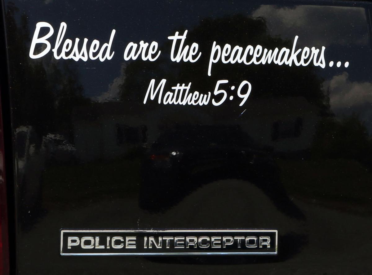 bible verse decals to come off patrol cars immediately montgomery