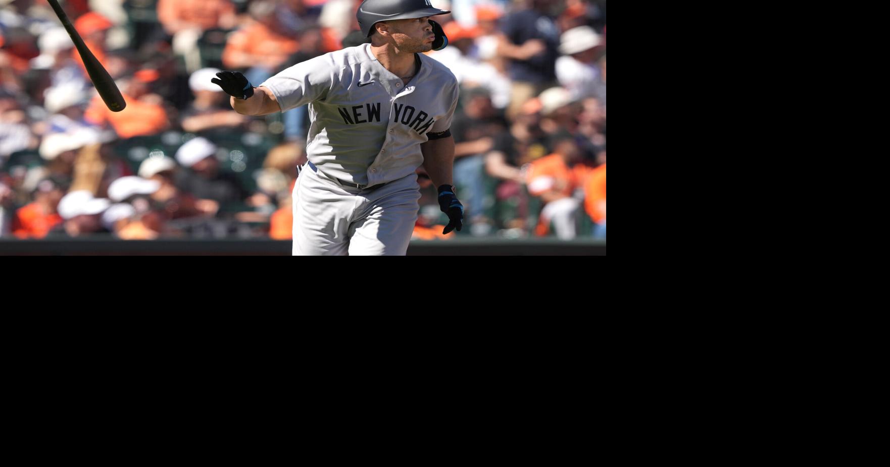 Mar 27, 2026; San Francisco, California, USA; New York Yankees designated hitter Giancarlo Stanton (27) tosses his bat after hitting a home run against the San Francisco Giants during the sixth inning at Oracle Park. Mandatory Credit: Darren Yamashita-Ima