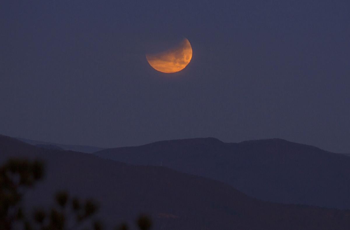 A blue supermoon eclipse sets over Roanoke Gallery