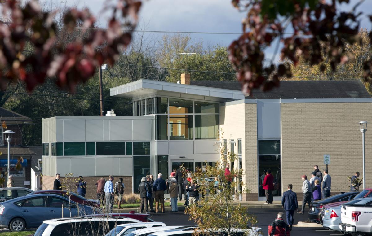 Williamson Road library reopens with more space and books and a giant