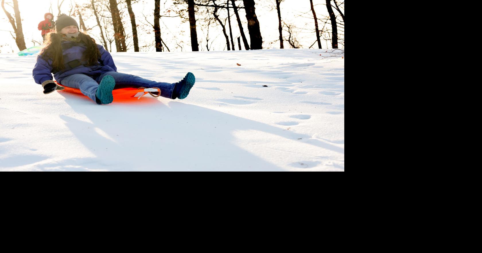 Photos of sledding, shoveling snow in Roanoke after storm