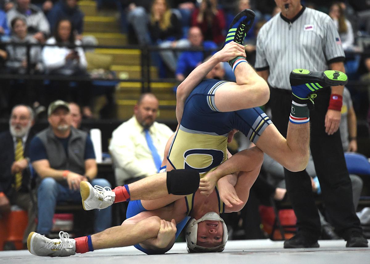 Scenes from the championship bouts of the VHSL Class 3 state wrestling