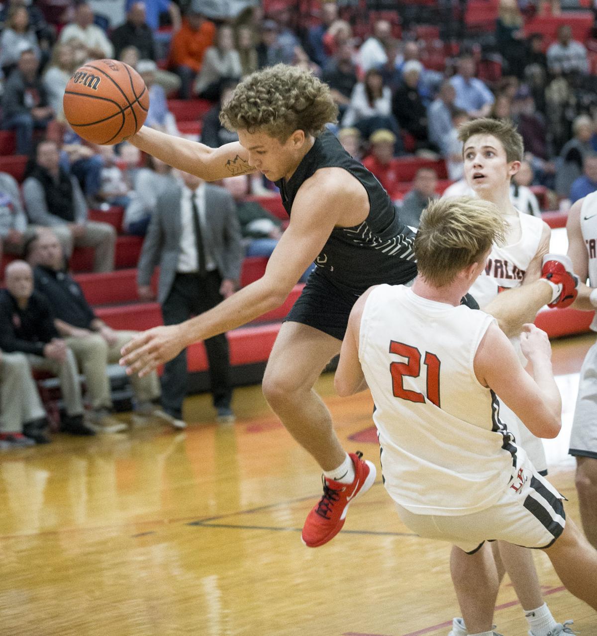 H.S. boys basketball Cave Spring holds off hotshooting Lord Botetourt