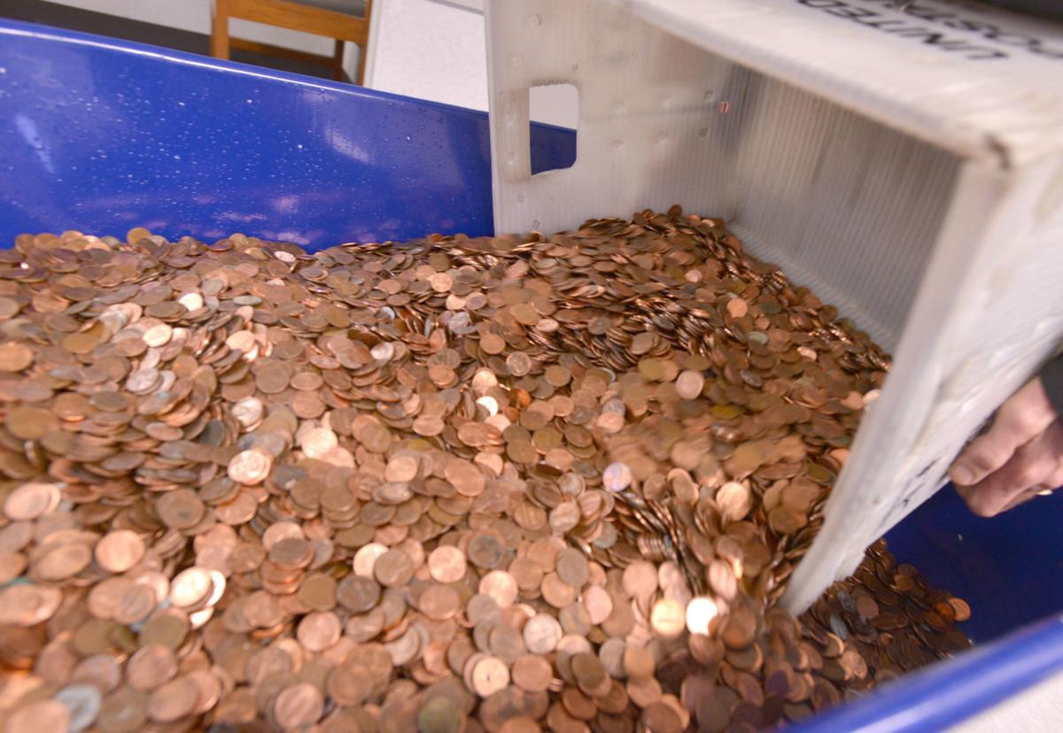 Virginia man spends $1,000 to deliver 300,000 pennies to Lebanon DMV