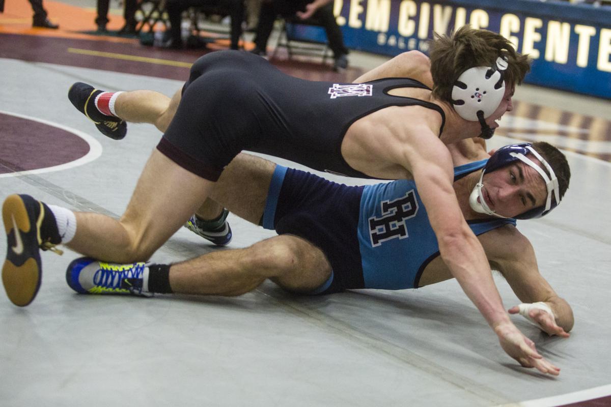 Scenes from the Class 1A state wrestling final Gallery