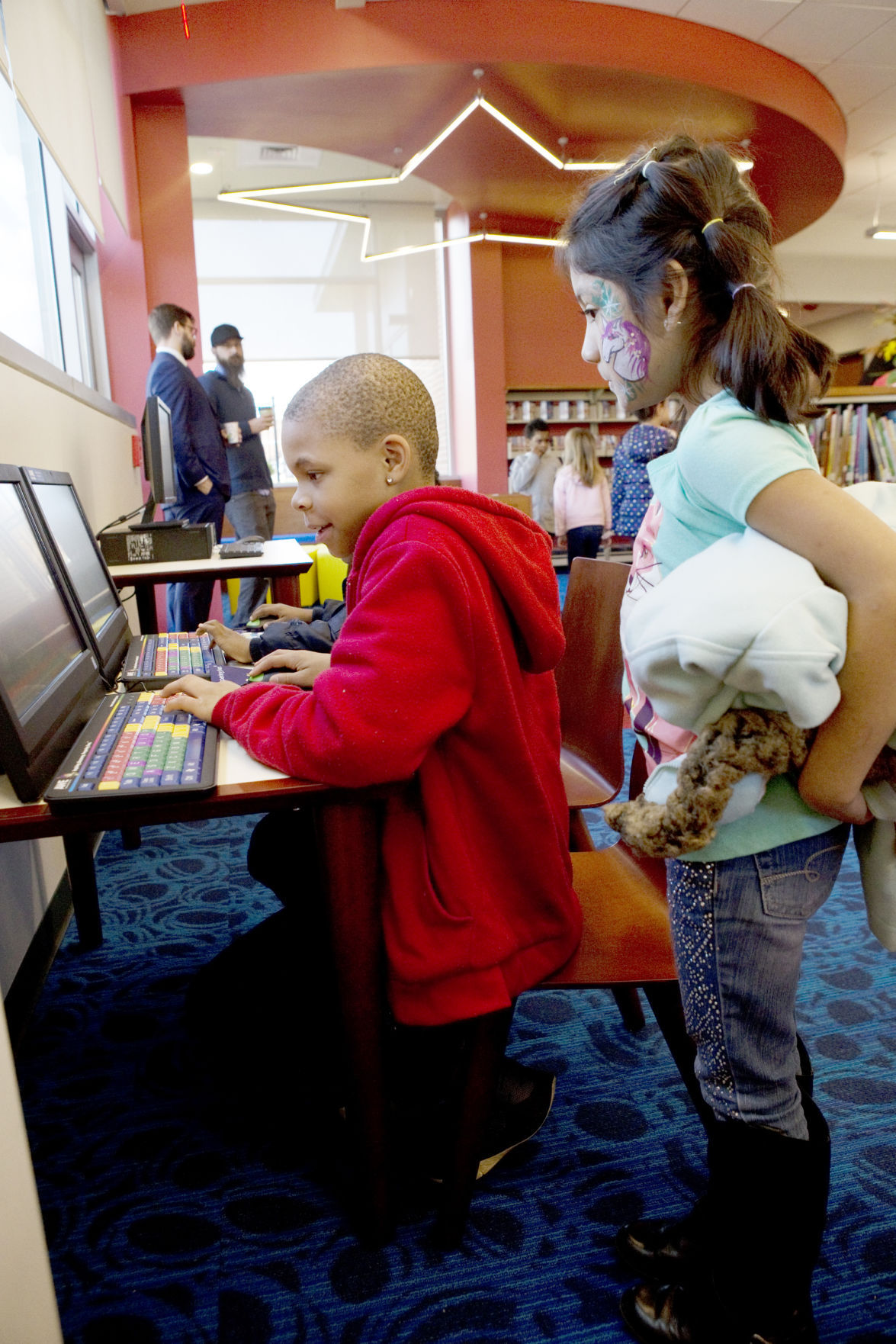 Williamson Road library reopens with more space and books and a giant