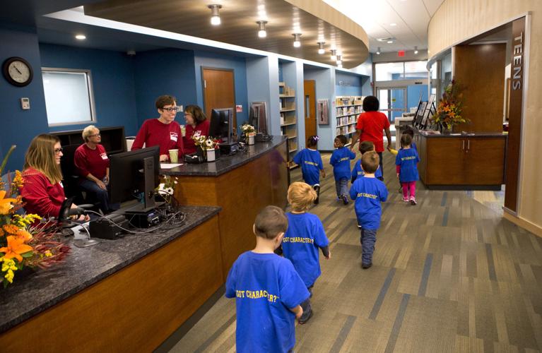Williamson Road library reopens with more space and books and a giant