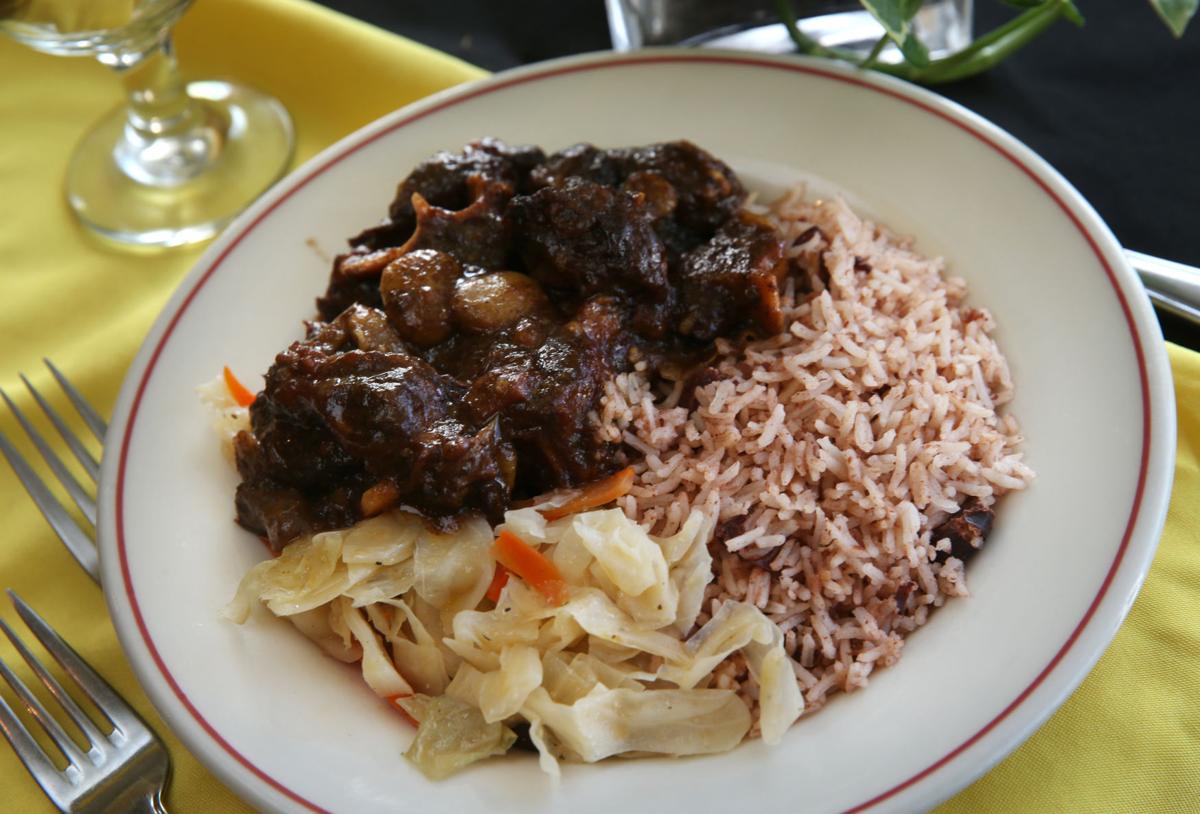 Restaurant review 876 Jamaican Grill offers homecooked versions of classics Reviews Restaurant review 876 Jamaican Grill offers homecooked versions of classics Reviews