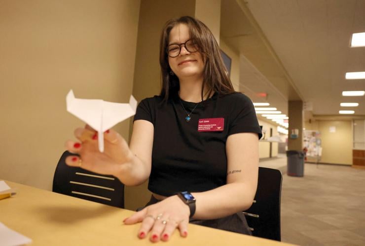 Paper airplane contest highlights aviation history exhibit