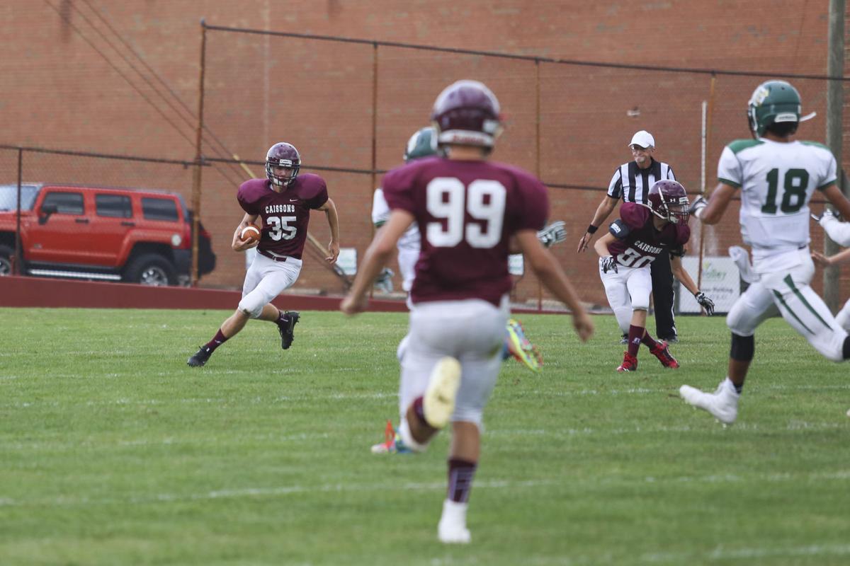 Scenes from the Roanoke CatholicFishburne Military football game on