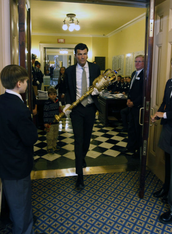 Sergeant at arms for House of Delegates bears symbolic mace with pride