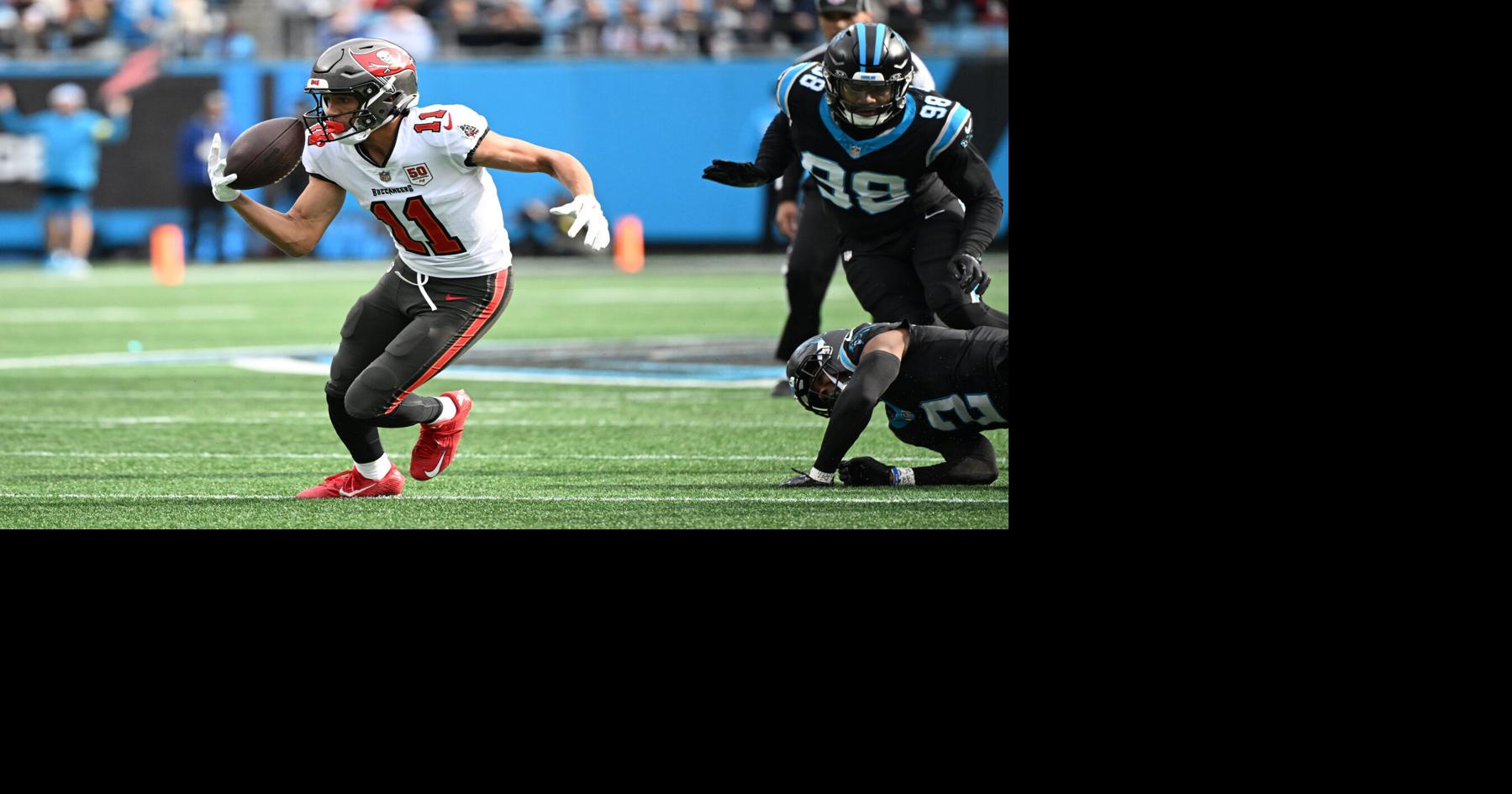 Tampa Bay Buccaneers wide receiver Jalen McMillan (11) makes a catch during the first half against the Carolina Panthers at Bank of America Stadium.