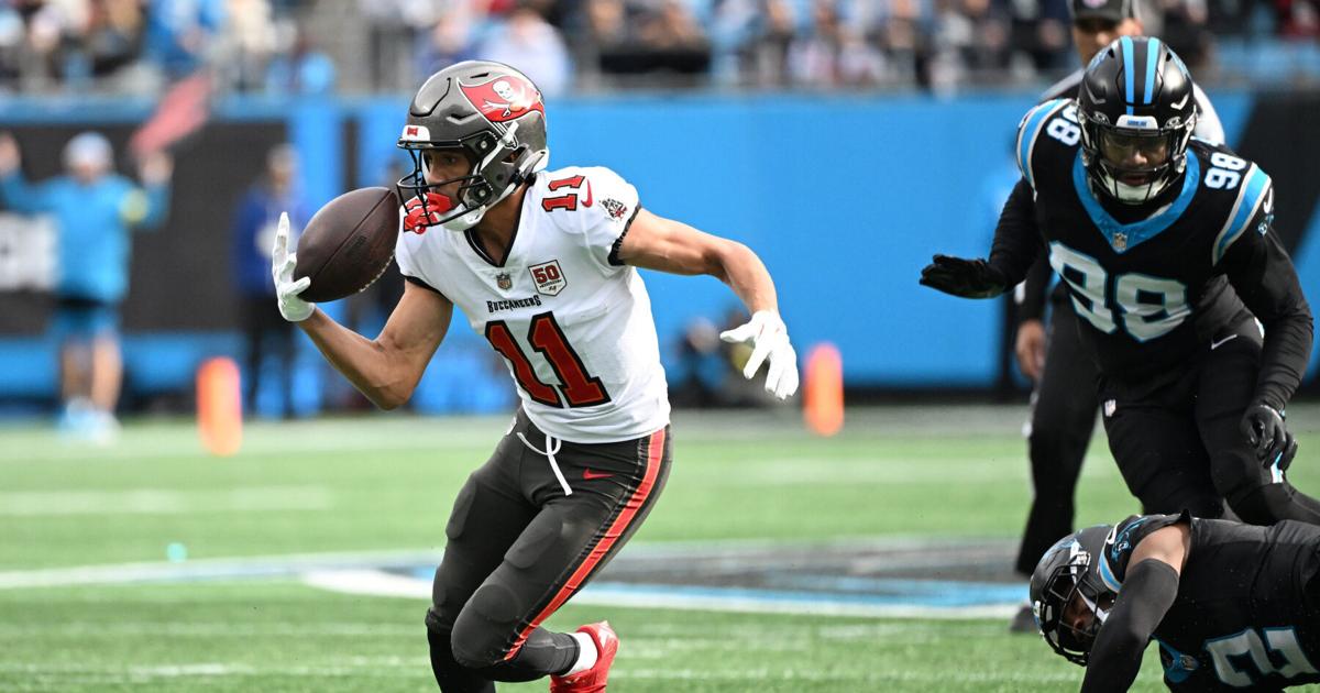 Tampa Bay Buccaneers wide receiver Jalen McMillan (11) makes a catch during the first half against the Carolina Panthers at Bank of America Stadium.
