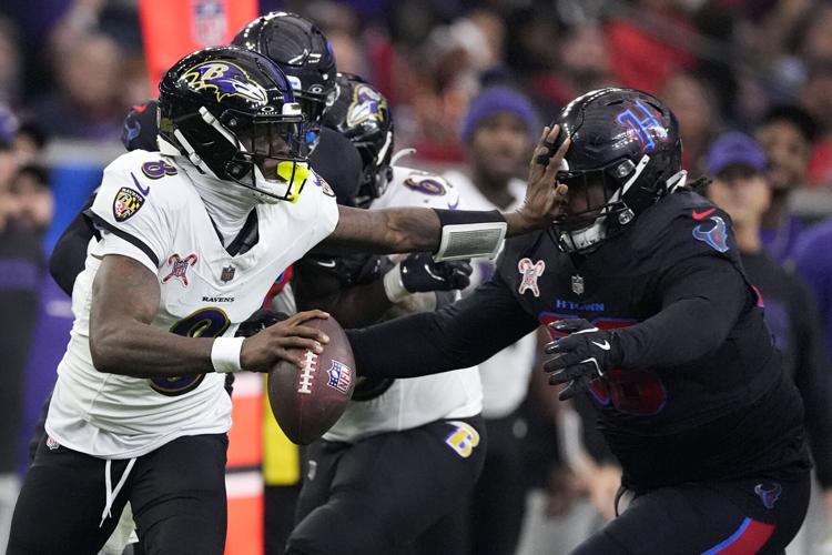 Baltimore's Jackson passes Vick for most yards rushing by a QB in NFL  history