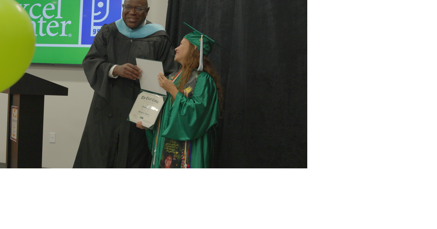 Roanoke's new adult high school celebrates first graduate