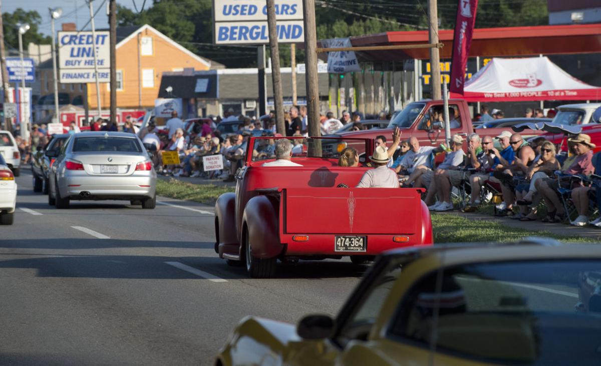 Classic cars cruise Roanoke's Williamson Road during 'Motor Madness