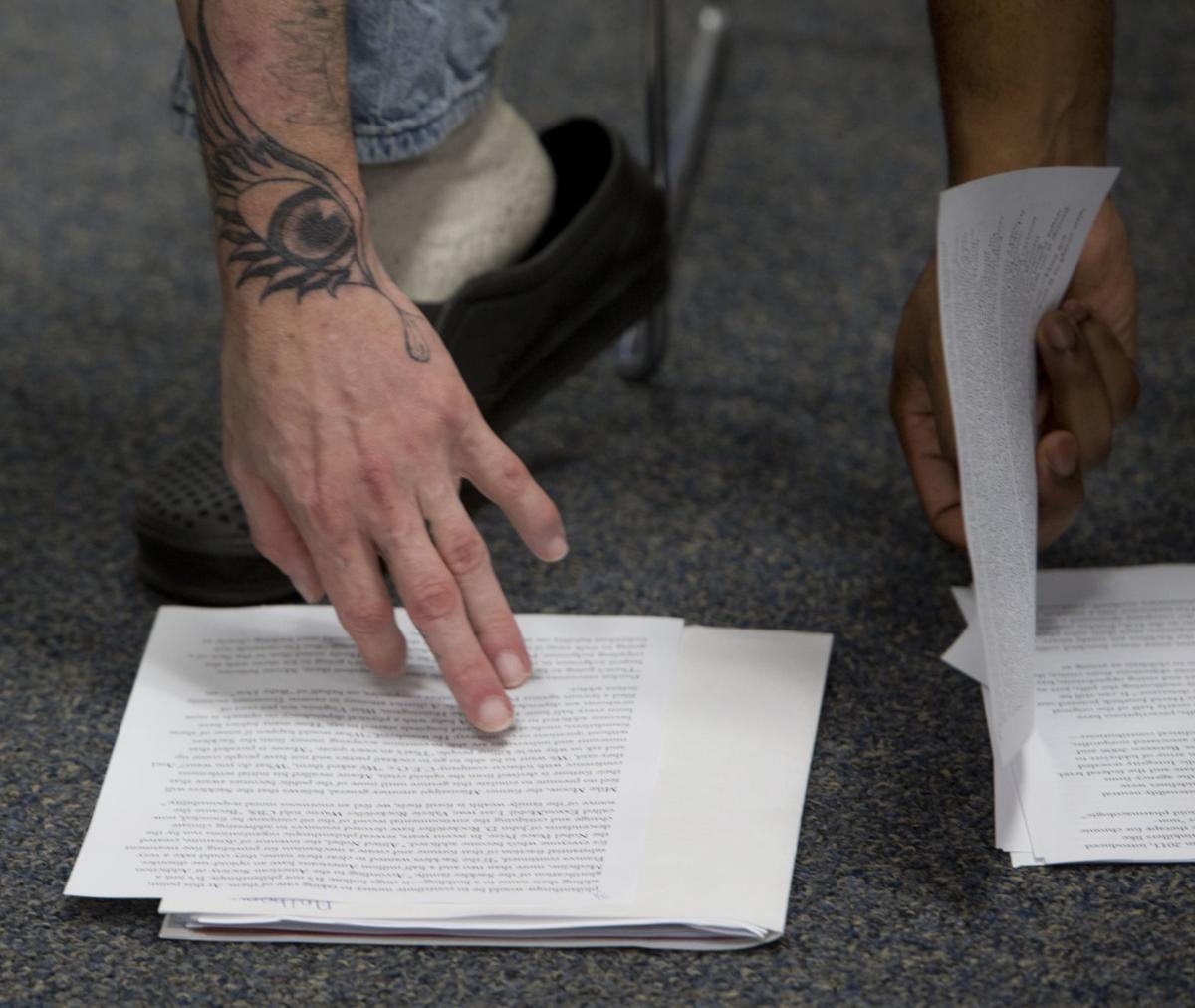 Photos Roanoke College students, county inmates tackle class side by