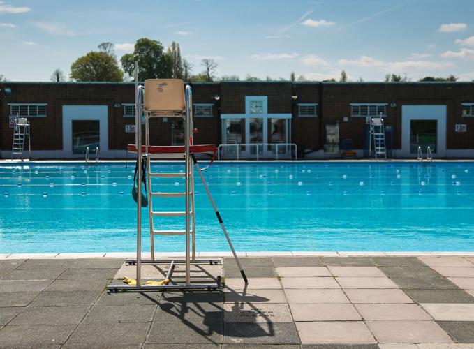 Lido - outside swimming pool with lifeguard chair in foreground