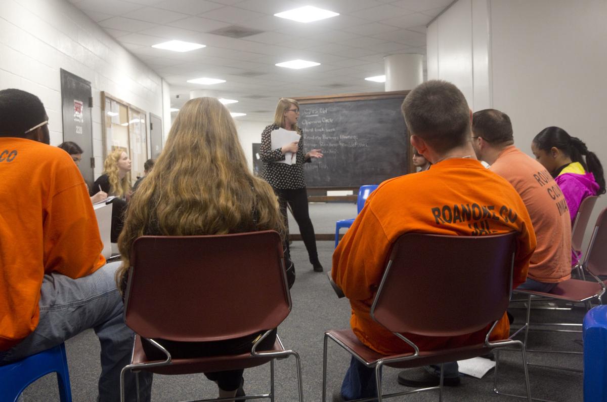 Photos Roanoke College students, county inmates tackle class side by