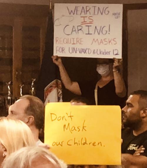 Warring signs at Franklin County School Board meeting