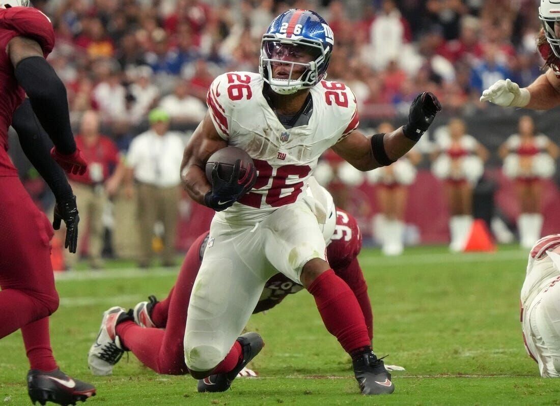 Saquon Barkley of the New York Giants runs with the ball against