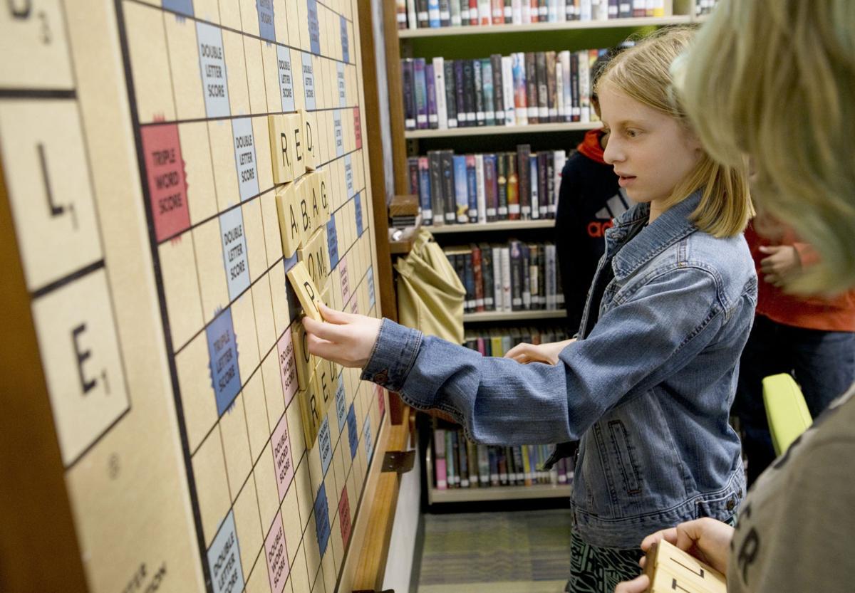 Williamson Road library reopens with more space and books and a giant