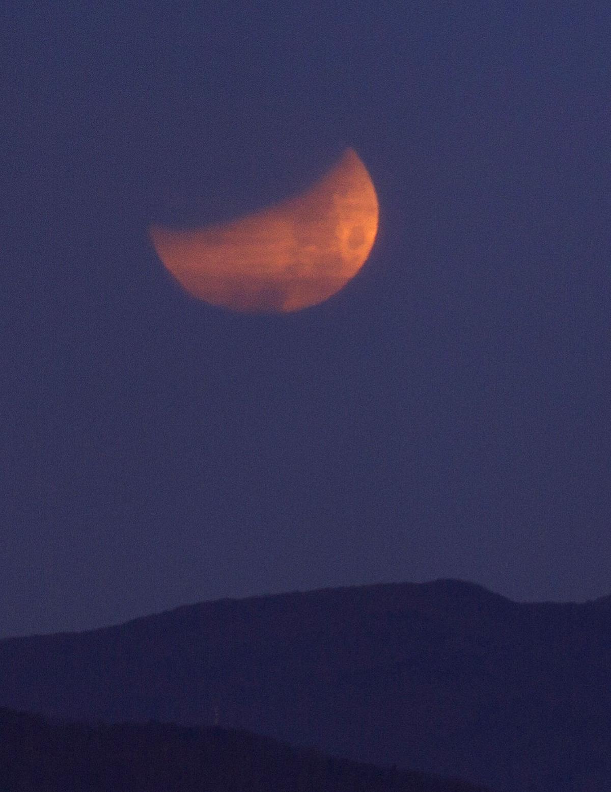 A blue supermoon eclipse sets over Roanoke Gallery