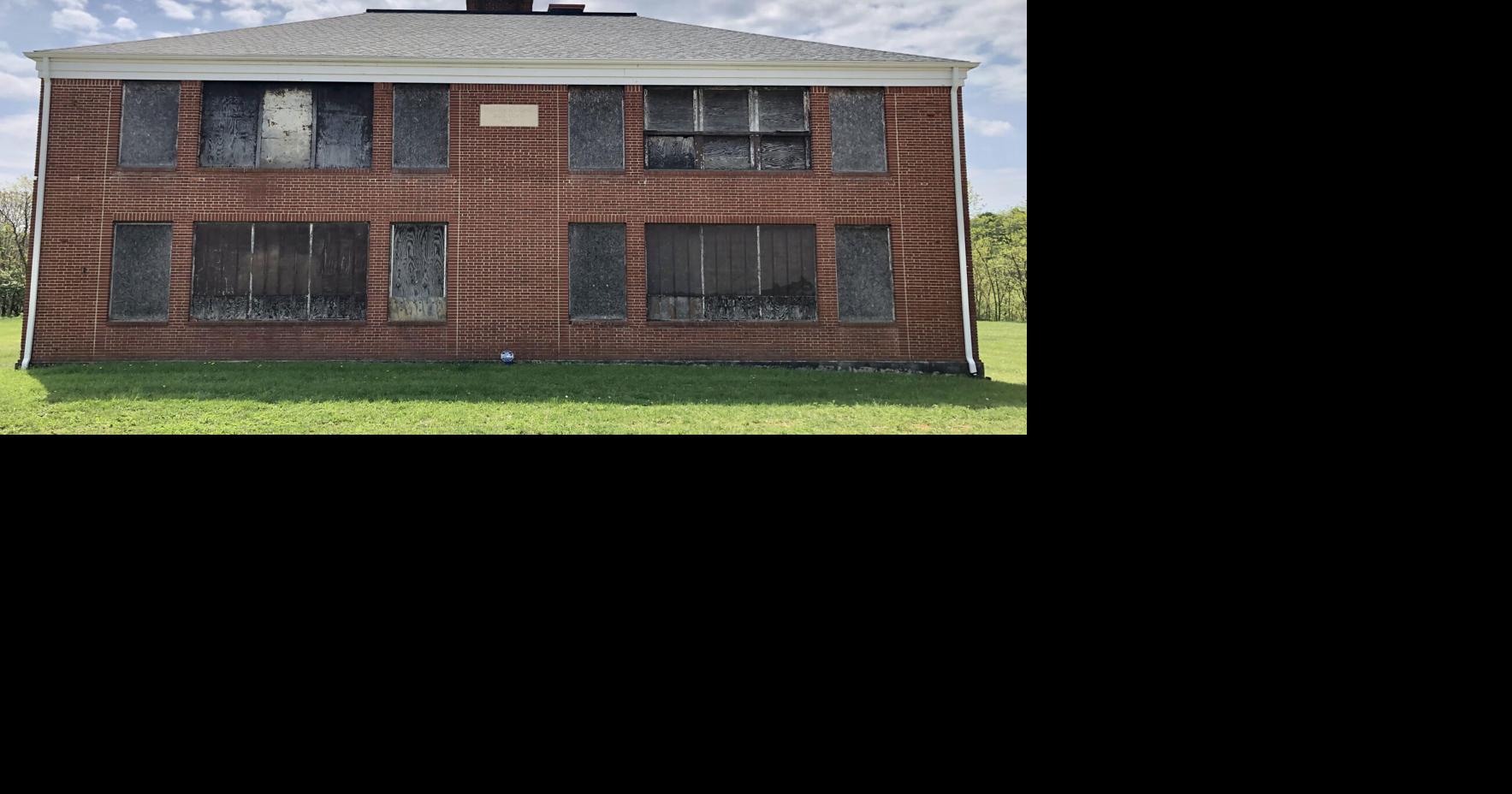 Who will restore the Edgar A. Long Building?