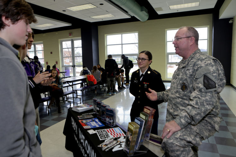 Patrick Henry queen, football player is now Pvt. Ammie Cook