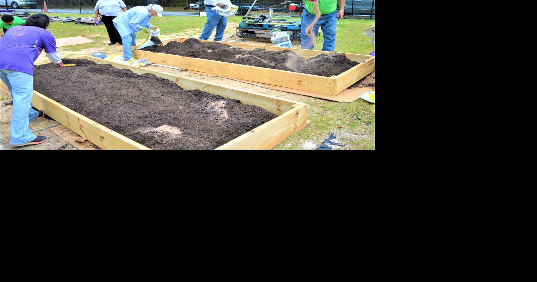 Rockdale Water and Soil Conservation donates garden beds to