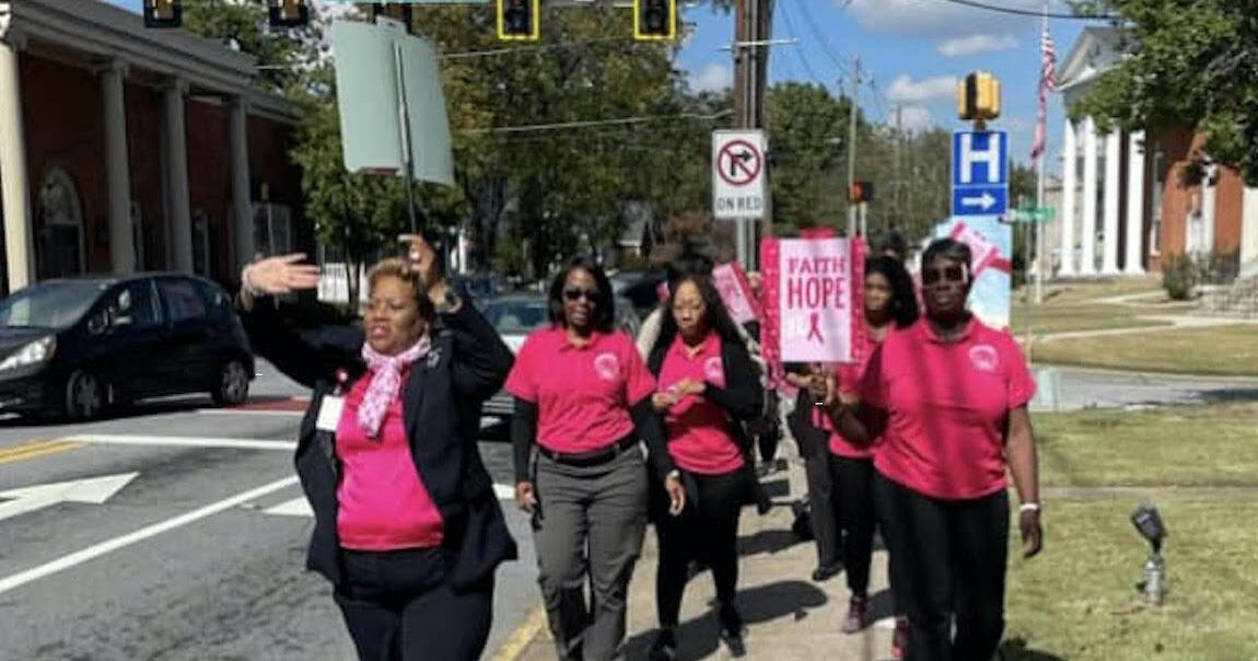 Clerk of Courts Janice Morris leads breast cancer awareness walk
