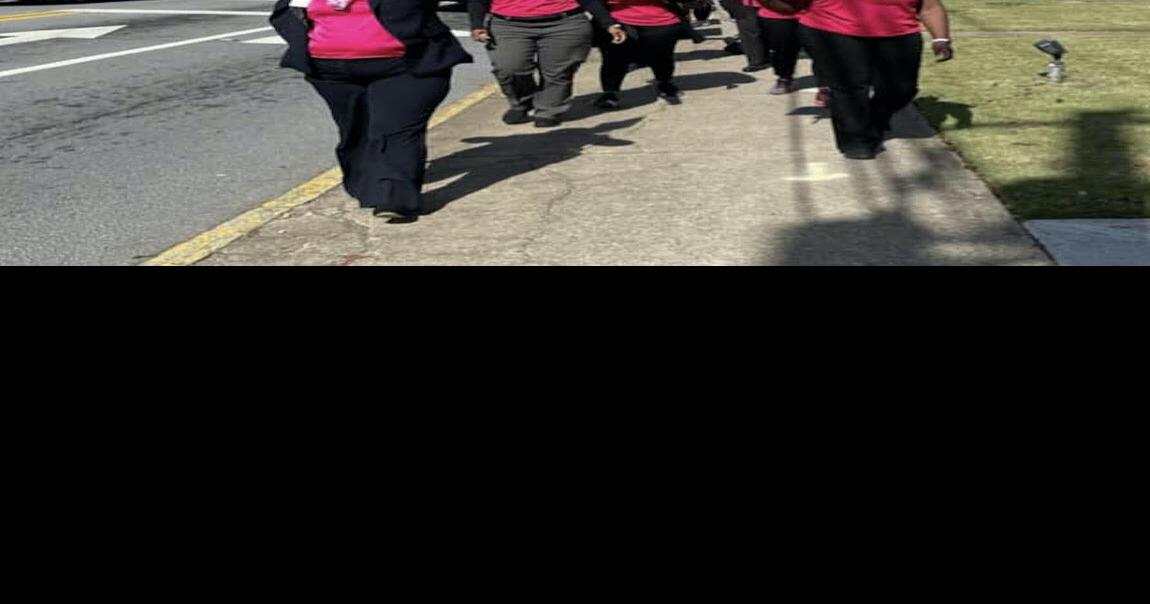 Clerk of Courts Janice Morris leads breast cancer awareness walk