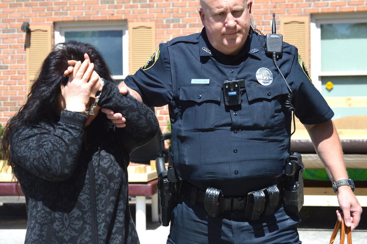 PHOTOS Police raid two spas in Covington, arrest three Multimedia