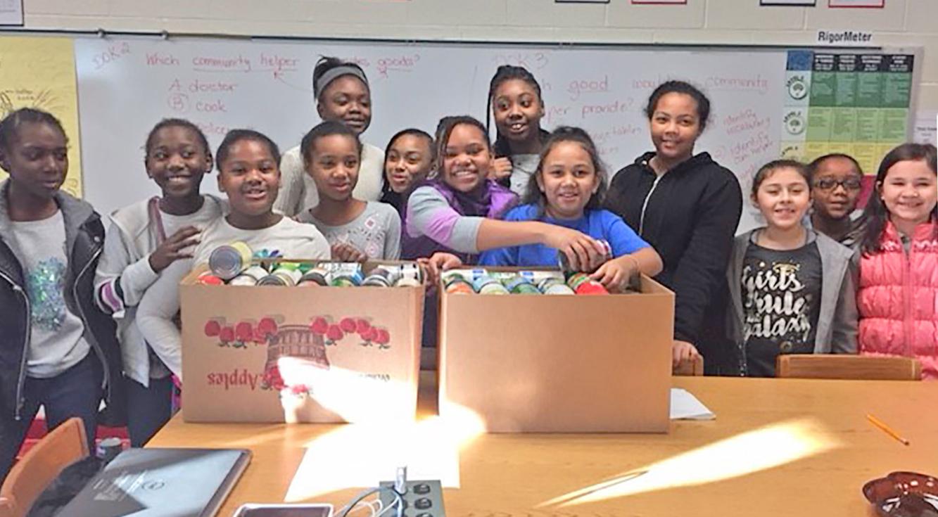 Rockdale Elementary Schools donate food to Phoenix Pass School