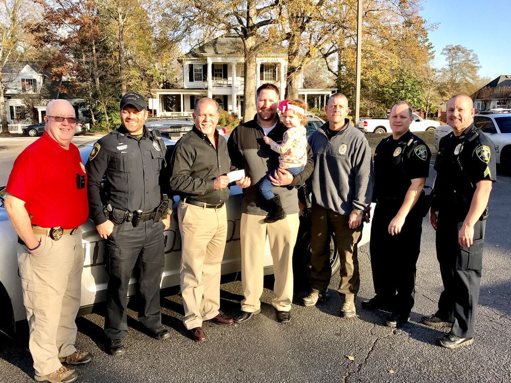 Covington Police Who Care Fund Donates To Gatlinburg Family | Local ...