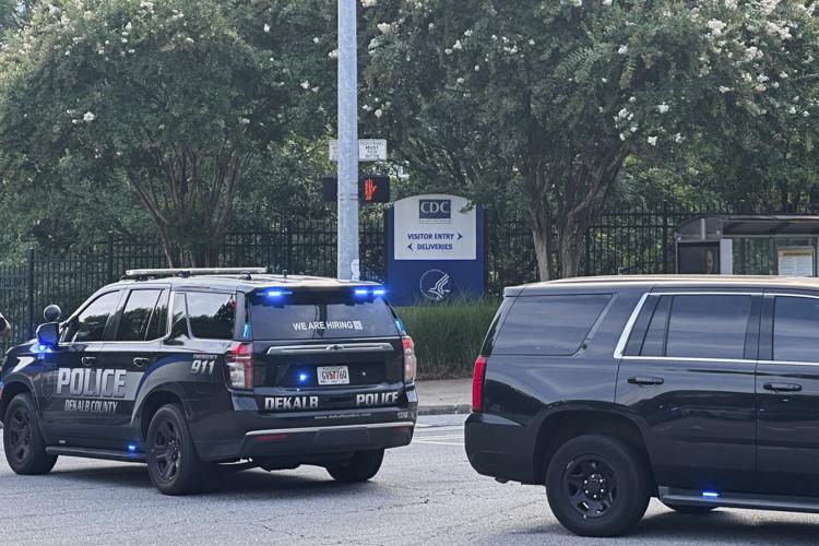 Suspected gunman and police officer dead in shooting near the CDC and