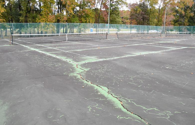 City urged to repair rundown tennis courts at Englewood Park Local