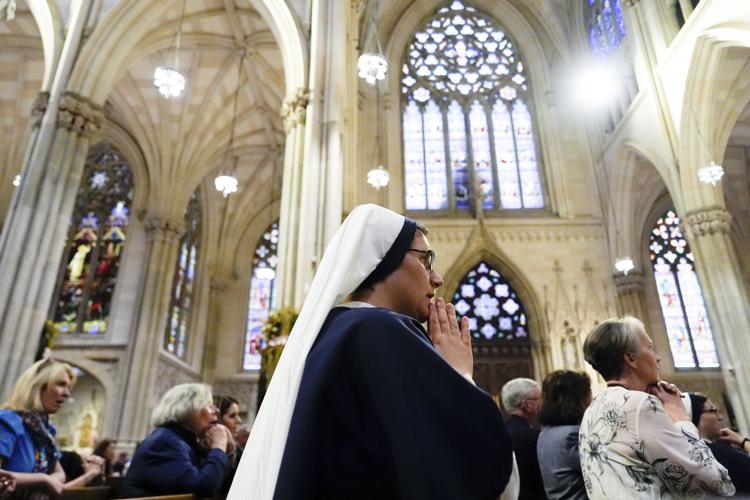 Catholic faithful pay their final respects to Pope Francis as public