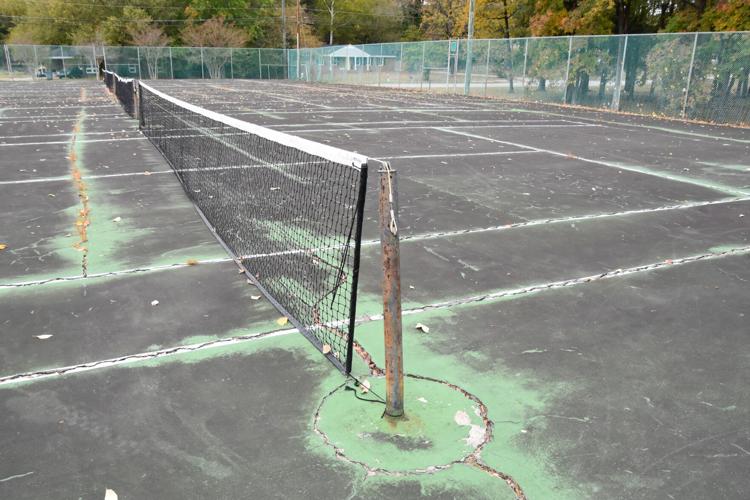 City urged to repair rundown tennis courts at Englewood Park Local